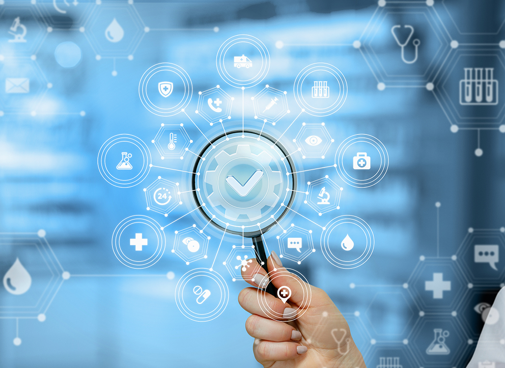 Magnifying glass over light blue background and white healthcare icons